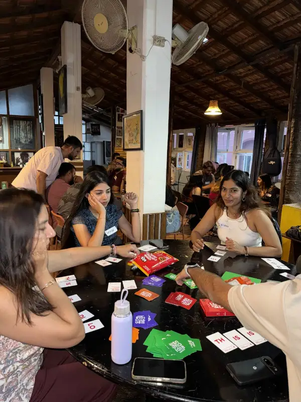 Guests playing cards at a game night